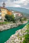 Slovenia, Kanal ob Soci. Soca River and bridge in city. Art Print